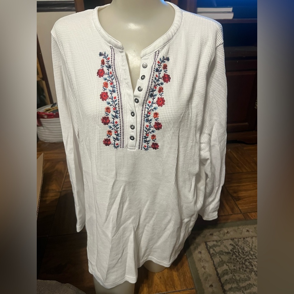 Woman Within White Tunic with Red and Blue Embroidery